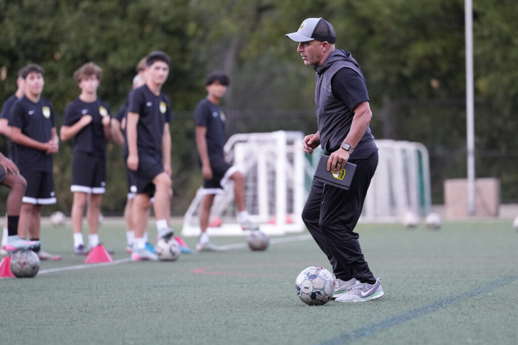 Los Gatos United Technical Director Shaun Tsakiris leading an advanced training session with older players