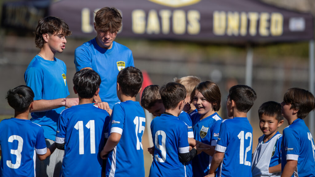 Los Gatos United Boys ECNL players coaching a U10 recreational team after the Fall Classic final