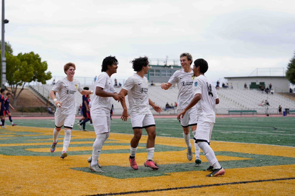 Los Gatos United U19 boys celebrating during ECNL competition