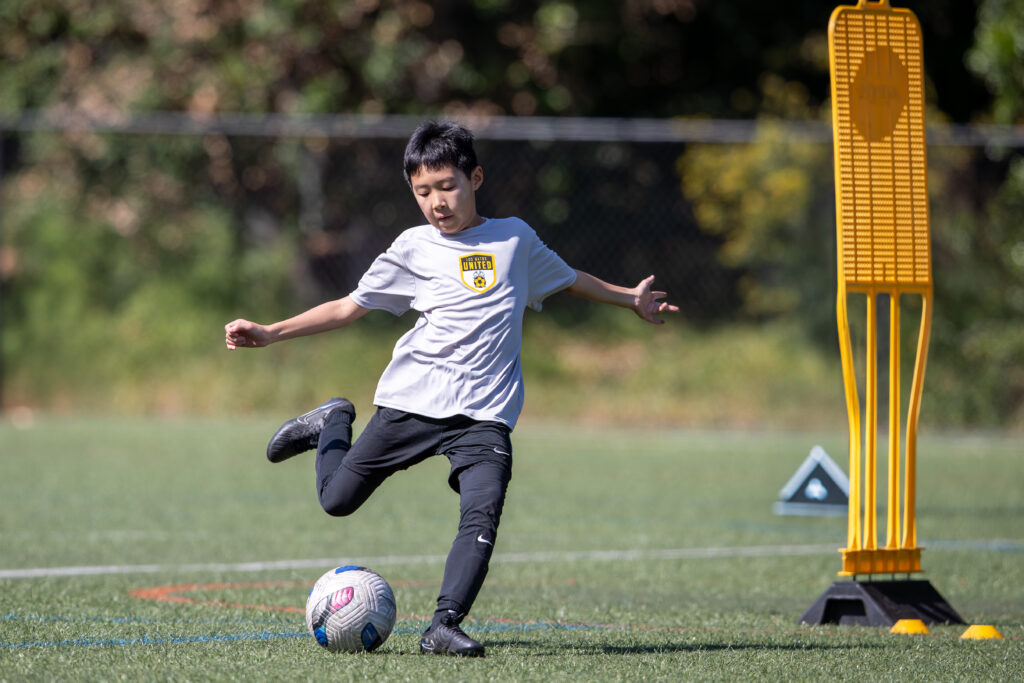 Player in action at Los Gatos United Spring Break Soccer Finishing Camp
